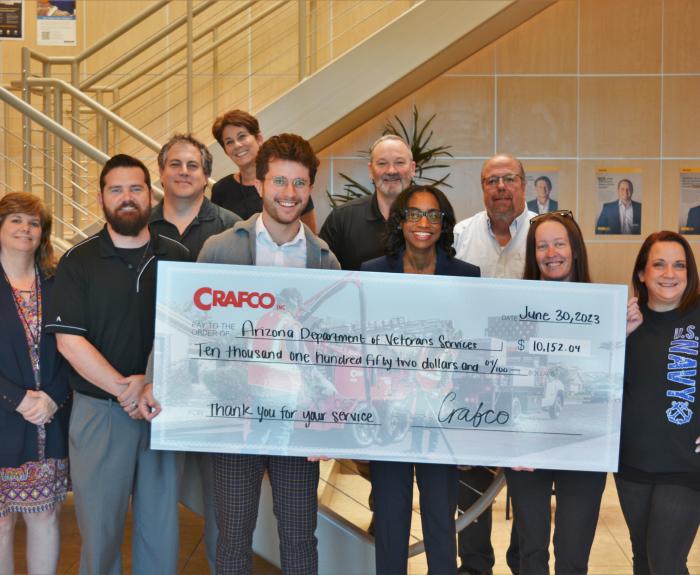 Crafco Inc. presents ADVS Director Dana Allmond with donation to the Veterans' Donation Fund